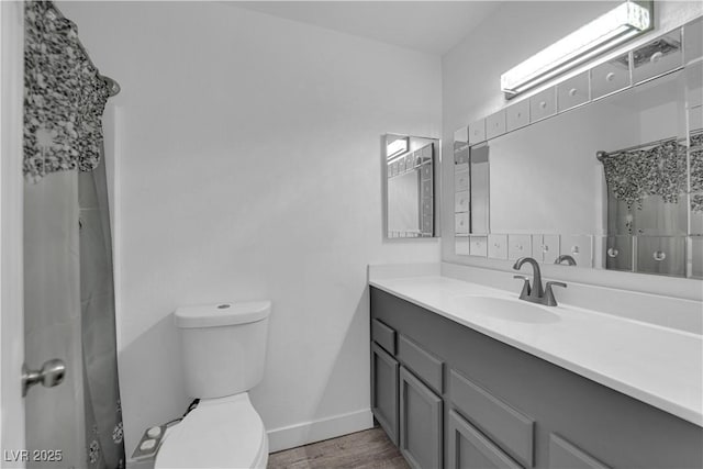 6129 Bedrock Ct, North Las Vegas, NV 89031 - full bath with vanity, wood finished floors, and curtained shower