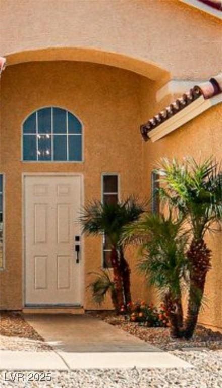 1002 Christopher View Ave, North Las Vegas, NV 89032 - entrance to property with stucco siding