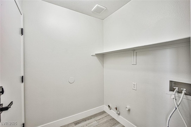 1002 Christopher View Ave, North Las Vegas, NV 89032 - washroom featuring gas dryer hookup, light wood finished floors, and hookup for a washing machine