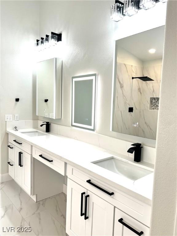 1002 Christopher View Ave, North Las Vegas, NV 89032 - full bathroom with double vanity, a marble finish shower, and marble look tiles