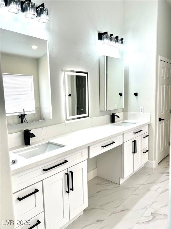 1002 Christopher View Ave, North Las Vegas, NV 89032 - full bath featuring double vanity and marble finish floors