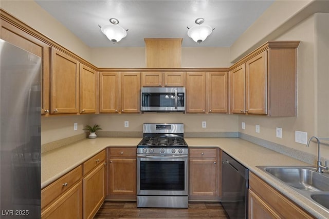 4625 Centisimo Dr Unit 202, North Las Vegas, NV 89084 - kitchen featuring stainless steel appliances, dark wood-type flooring, and light countertops