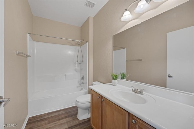 4625 Centisimo Dr Unit 202, North Las Vegas, NV 89084 - bathroom featuring wood finished floors, vanity, and tub / shower combination
