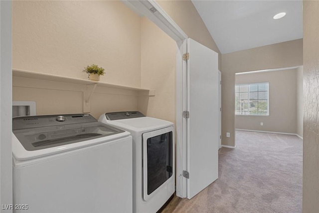 4625 Centisimo Dr Unit 202, North Las Vegas, NV 89084 - laundry room featuring washer and clothes dryer and light colored carpet
