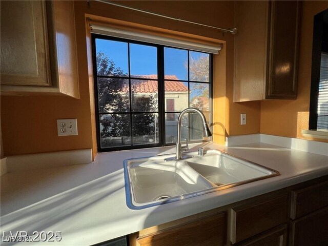 4855 S Torrey Pines Dr Unit 201, Las Vegas, NV 89103 - kitchen with a sink and light countertops