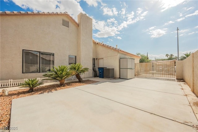 3648 Glen Ridge Way, Las Vegas, NV 89108 - fenced backyard featuring driveway and a patio area