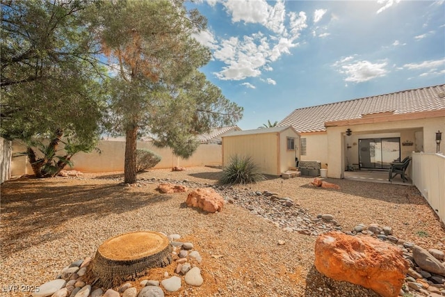 3648 Glen Ridge Way, Las Vegas, NV 89108 - fenced backyard featuring a storage shed