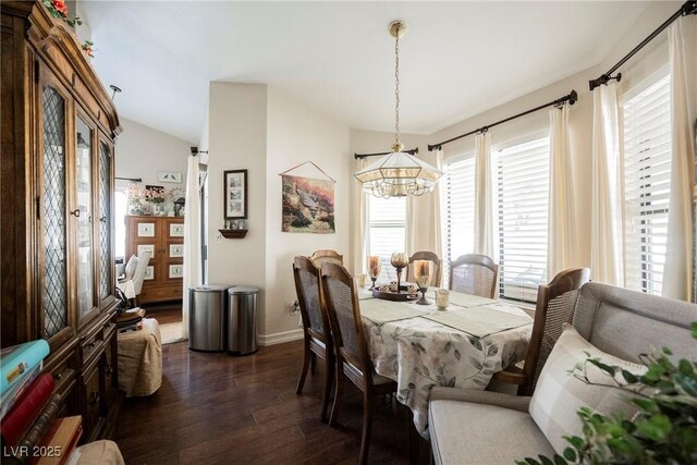 3648 Glen Ridge Way, Las Vegas, NV 89108 - dining space with a chandelier, dark wood-type flooring, and vaulted ceiling