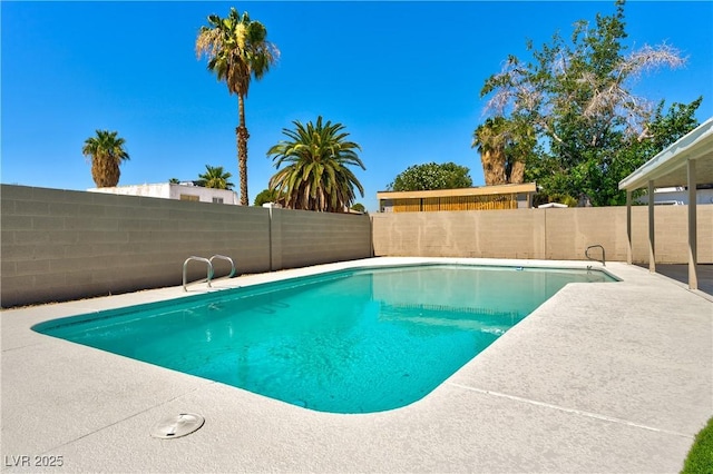 4135 E Harmon Ave, Las Vegas, NV 89121 - view of swimming pool with a fenced backyard and a patio area
