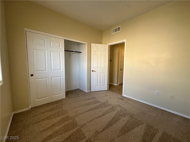 1050 E Cactus Ave Unit 2086, Las Vegas, NV 89183 - unfurnished bedroom with carpet flooring and a closet
