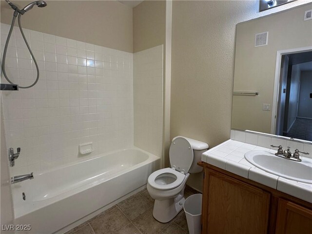 1050 E Cactus Ave Unit 2086, Las Vegas, NV 89183 - bathroom with vanity, washtub / shower combination, and tile patterned flooring