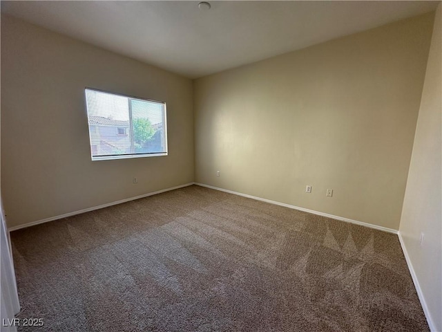 1050 E Cactus Ave Unit 2086, Las Vegas, NV 89183 - unfurnished room featuring carpet floors and baseboards