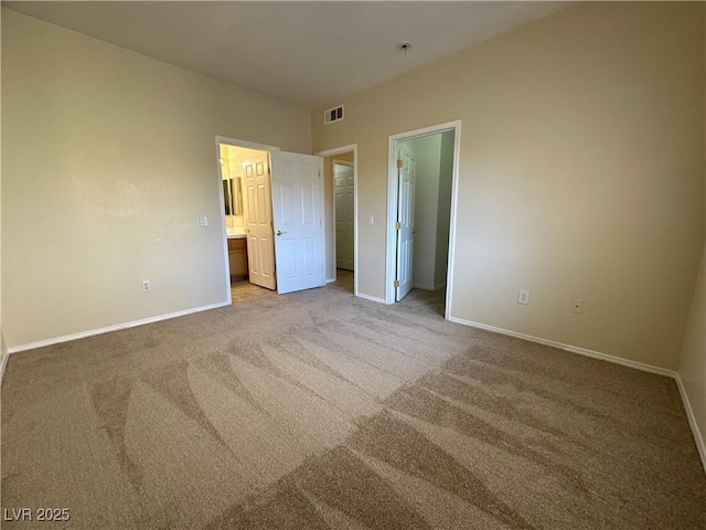 1050 E Cactus Ave Unit 2086, Las Vegas, NV 89183 - unfurnished bedroom featuring a spacious closet, carpet, and connected bathroom