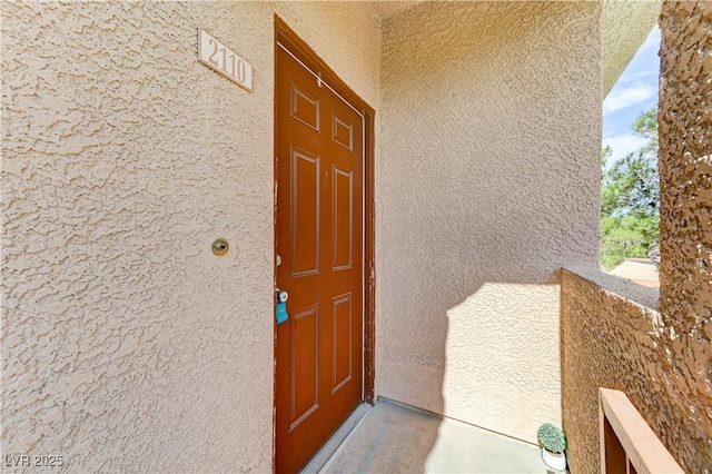 1050 E Cactus Ave Unit 2110, Las Vegas, NV 89183 - doorway to property with stucco siding