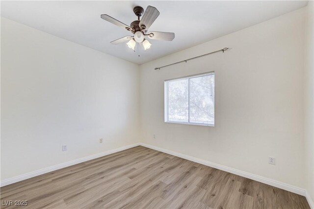1050 E Cactus Ave Unit 2110, Las Vegas, NV 89183 - unfurnished room featuring light wood finished floors and a ceiling fan