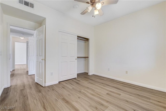 1050 E Cactus Ave Unit 2110, Las Vegas, NV 89183 - unfurnished bedroom featuring light wood finished floors, a closet, and ceiling fan