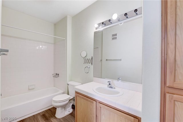 1050 E Cactus Ave Unit 2110, Las Vegas, NV 89183 - full bath featuring vanity, wood finished floors, and bathing tub / shower combination