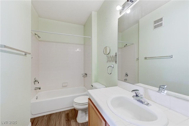 1050 E Cactus Ave Unit 2110, Las Vegas, NV 89183 - bathroom featuring vanity, wood finished floors, and bathing tub / shower combination