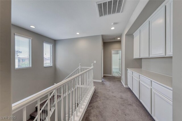 12313 Old Muirfield St, Las Vegas, NV 89141 - corridor featuring recessed lighting, light colored carpet, and an upstairs landing