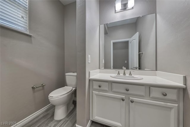 12313 Old Muirfield St, Las Vegas, NV 89141 - bathroom featuring baseboards and vanity