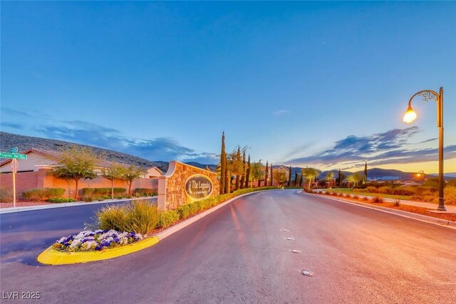 12313 Old Muirfield St, Las Vegas, NV 89141 - view of asphalt street featuring curbs and street lights