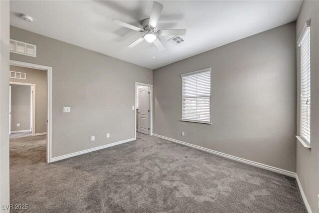 12313 Old Muirfield St, Las Vegas, NV 89141 - unfurnished bedroom featuring multiple windows, carpet, and ceiling fan