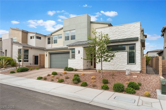 10280 Midnight Meteor Ave, Las Vegas, NV 89166 - view of front facade with concrete driveway, an attached garage, stucco siding, and stone siding