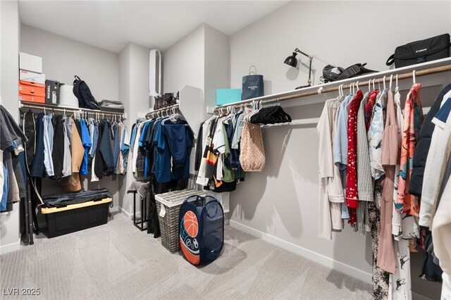 10280 Midnight Meteor Ave, Las Vegas, NV 89166 - walk in closet featuring carpet floors