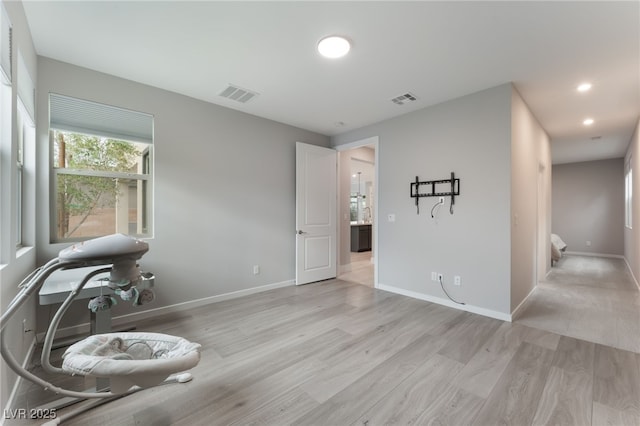 10280 Midnight Meteor Ave, Las Vegas, NV 89166 - unfurnished room featuring light wood-style flooring and recessed lighting