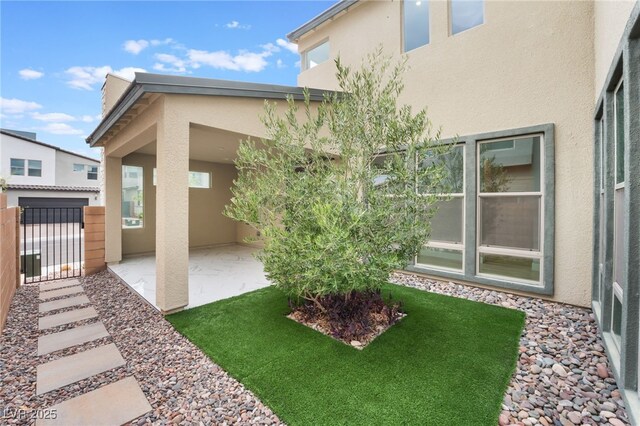 10280 Midnight Meteor Ave, Las Vegas, NV 89166 - view of yard featuring a patio and a gate