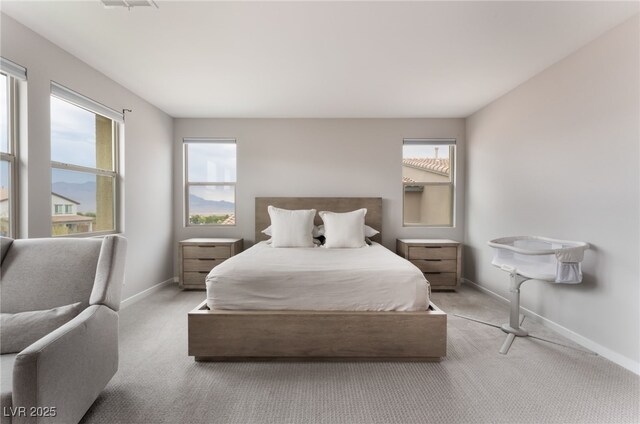 10280 Midnight Meteor Ave, Las Vegas, NV 89166 - bedroom with multiple windows and carpet floors