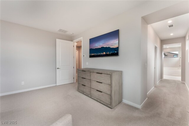 10280 Midnight Meteor Ave, Las Vegas, NV 89166 - unfurnished bedroom with light carpet, ensuite bath, and recessed lighting
