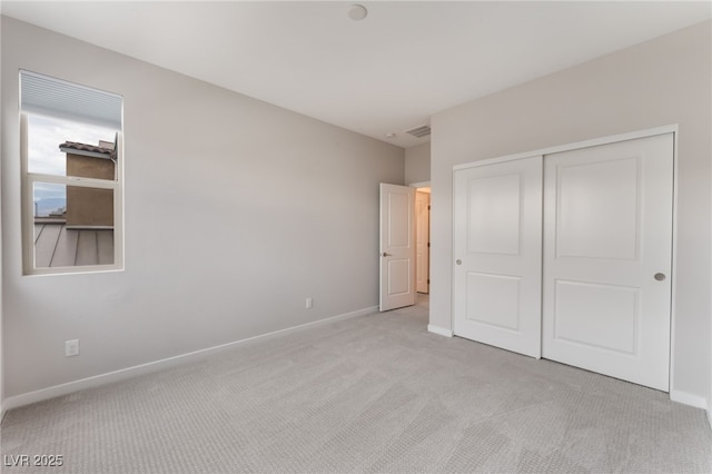 10280 Midnight Meteor Ave, Las Vegas, NV 89166 - unfurnished bedroom featuring light carpet and a closet