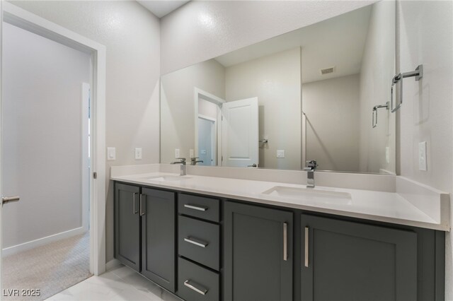 10280 Midnight Meteor Ave, Las Vegas, NV 89166 - full bath featuring double vanity and baseboards