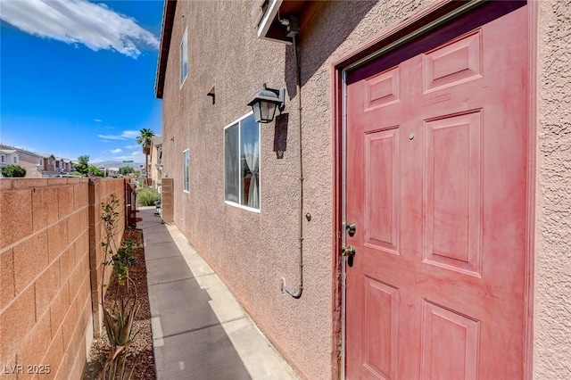 3673 Calypso Beach Ct, Las Vegas, NV 89115 - entrance to property featuring stucco siding