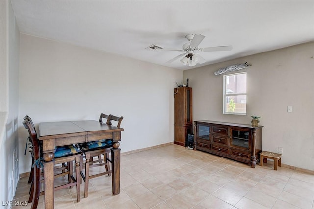 3673 Calypso Beach Ct, Las Vegas, NV 89115 - dining area with ceiling fan and light tile patterned floors