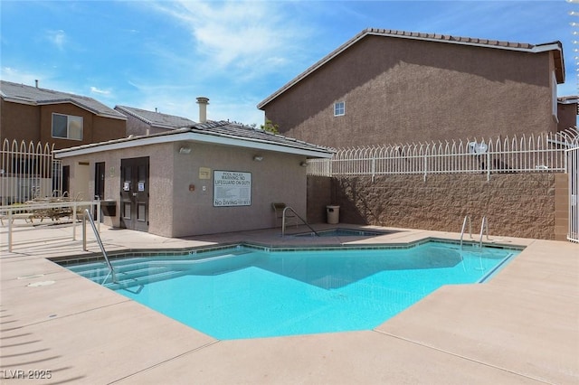 3673 Calypso Beach Ct, Las Vegas, NV 89115 - community pool featuring a patio