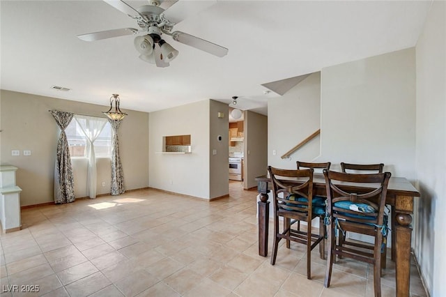 3673 Calypso Beach Ct, Las Vegas, NV 89115 - dining space featuring a ceiling fan and light tile patterned floors
