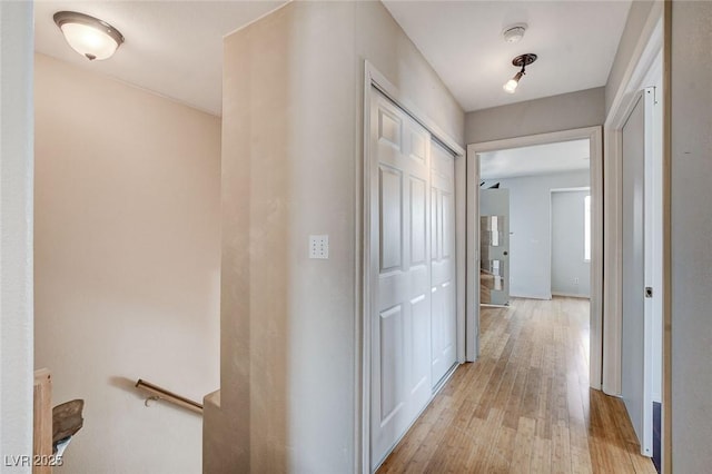 3673 Calypso Beach Ct, Las Vegas, NV 89115 - hallway featuring light wood-style flooring and baseboards