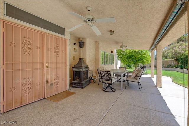 7613 Hackensack Ct, Las Vegas, NV 89128 - view of patio / terrace featuring a ceiling fan and outdoor dining area