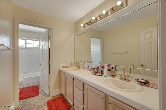 7613 Hackensack Ct, Las Vegas, NV 89128 - bathroom with double vanity and toilet