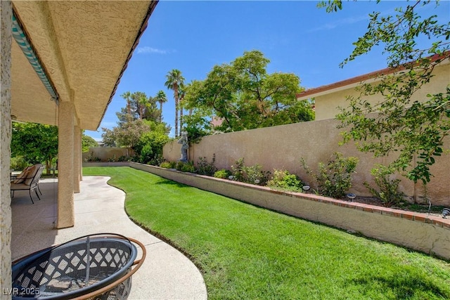 7613 Hackensack Ct, Las Vegas, NV 89128 - fenced backyard with a patio
