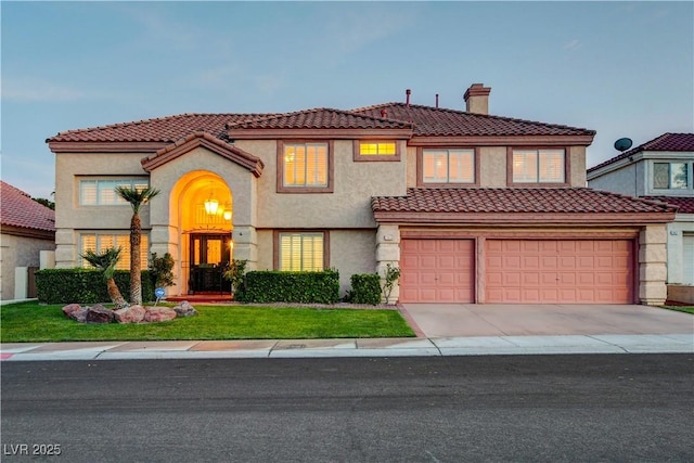 7613 Hackensack Ct, Las Vegas, NV 89128 - mediterranean / spanish-style home with concrete driveway, a chimney, stucco siding, a garage, and a tiled roof