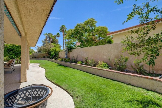 7613 Hackensack Ct, Las Vegas, NV 89128 - fenced backyard with a patio