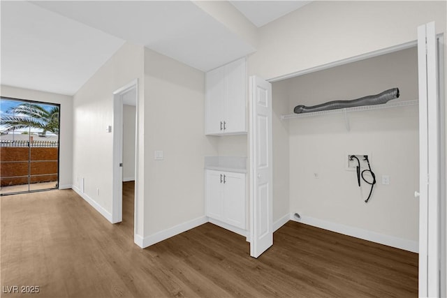 5174 S Jones Blvd Unit 105, Las Vegas, NV 89118 - laundry area featuring hookup for a washing machine and wood finished floors
