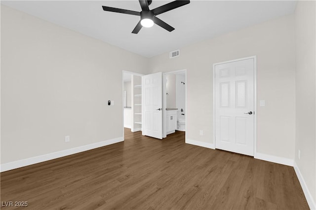 5174 S Jones Blvd Unit 105, Las Vegas, NV 89118 - unfurnished bedroom featuring wood finished floors, ensuite bath, and a ceiling fan