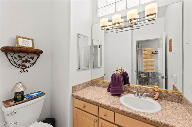 9136 Eagle Ridge Dr, Las Vegas, NV 89134 - bathroom featuring vanity and toilet