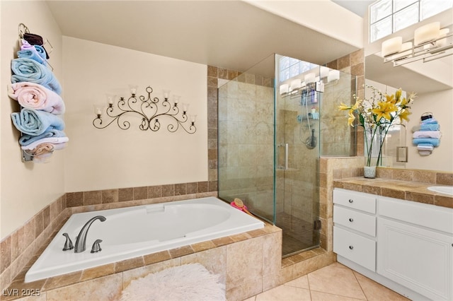9136 Eagle Ridge Dr, Las Vegas, NV 89134 - full bath featuring vanity, a garden tub, a stall shower, and tile patterned floors