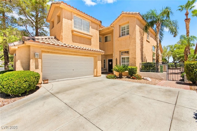 9136 Eagle Ridge Dr, Las Vegas, NV 89134 - mediterranean / spanish-style house featuring a gate, a tiled roof, driveway, and stucco siding