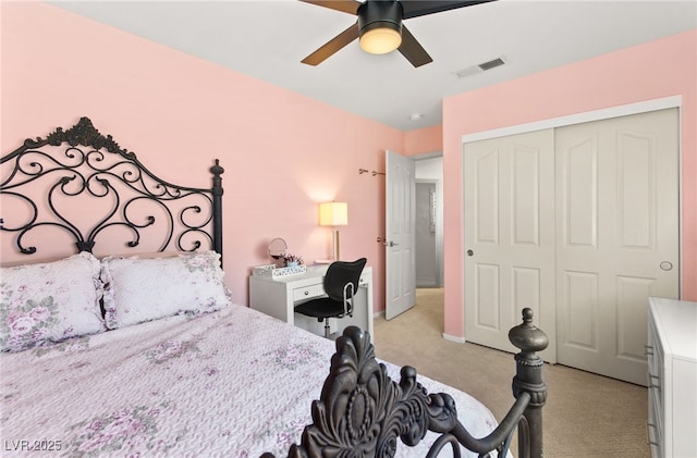 9136 Eagle Ridge Dr, Las Vegas, NV 89134 - bedroom with light colored carpet, a closet, and a ceiling fan